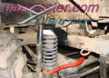 Кронштейн пружины и верхнее крепления амортизатора переносим.